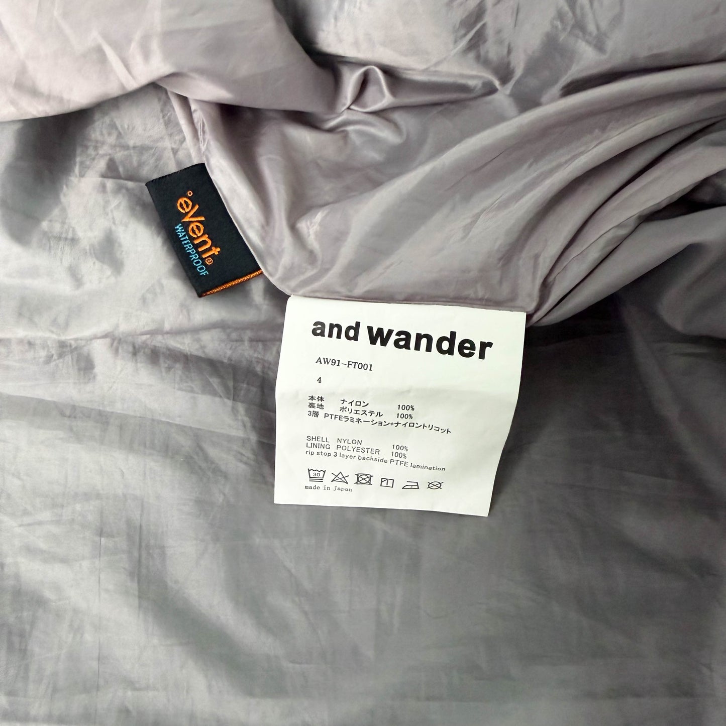 And Wander E Vent Drop Pocket Rain Jacket (L)
