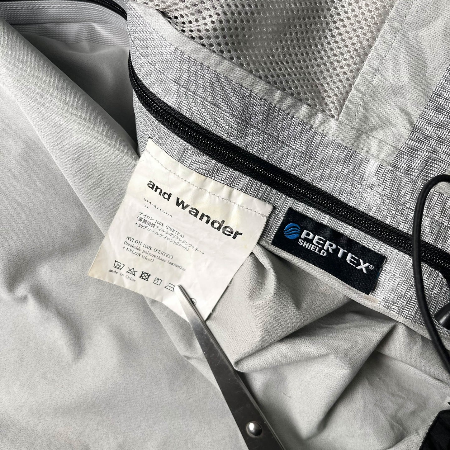 And Wander Pertex Shield Rain Jacket (XL)